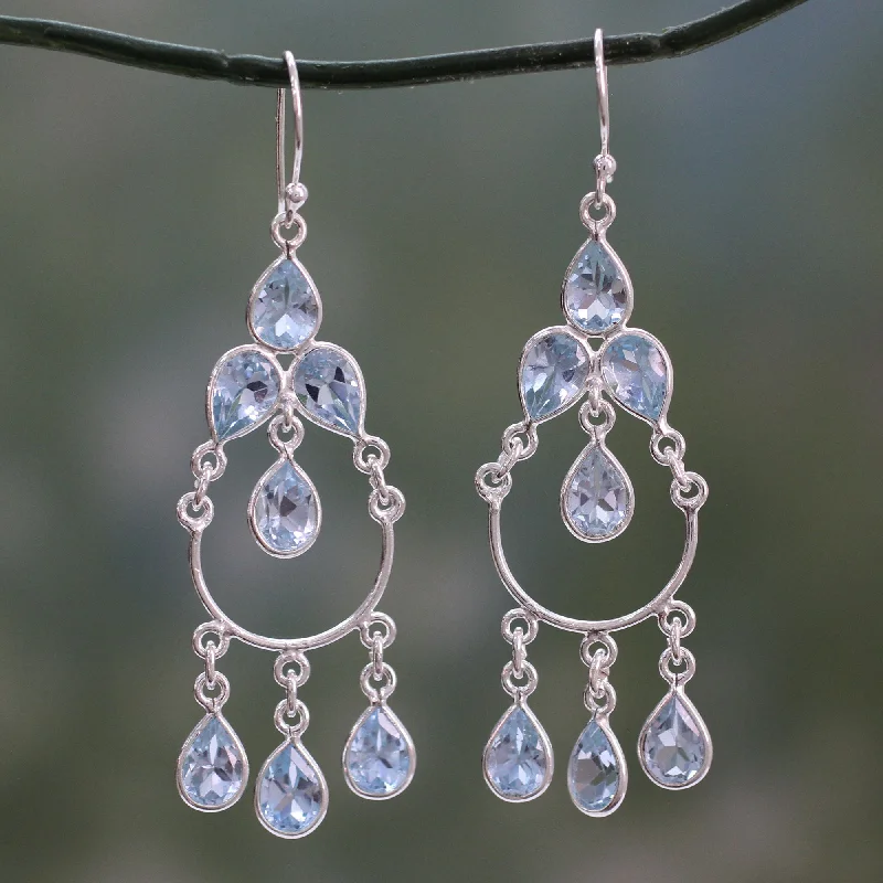 Hoop earrings with abstract wirework for an artistic, unique look-Azure Elegance Blue Topaz Handcrafted Sterling Silver Chandelier Earrings