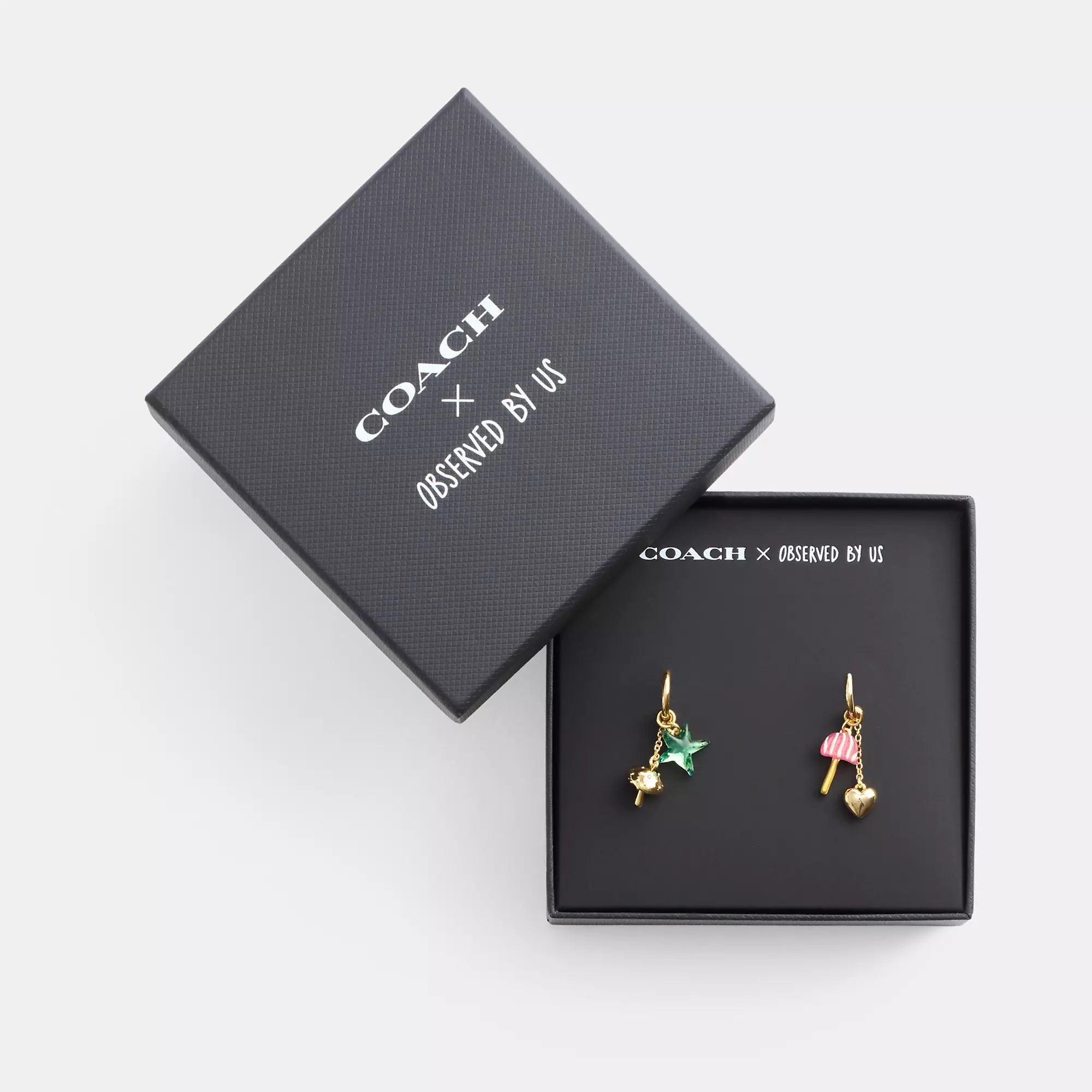 Best hoop earrings with satin ribbons for a soft, feminine appearance-Coach Outlet Coach X Observed By Us Mismatch Star And Mushroom Huggie Earrings