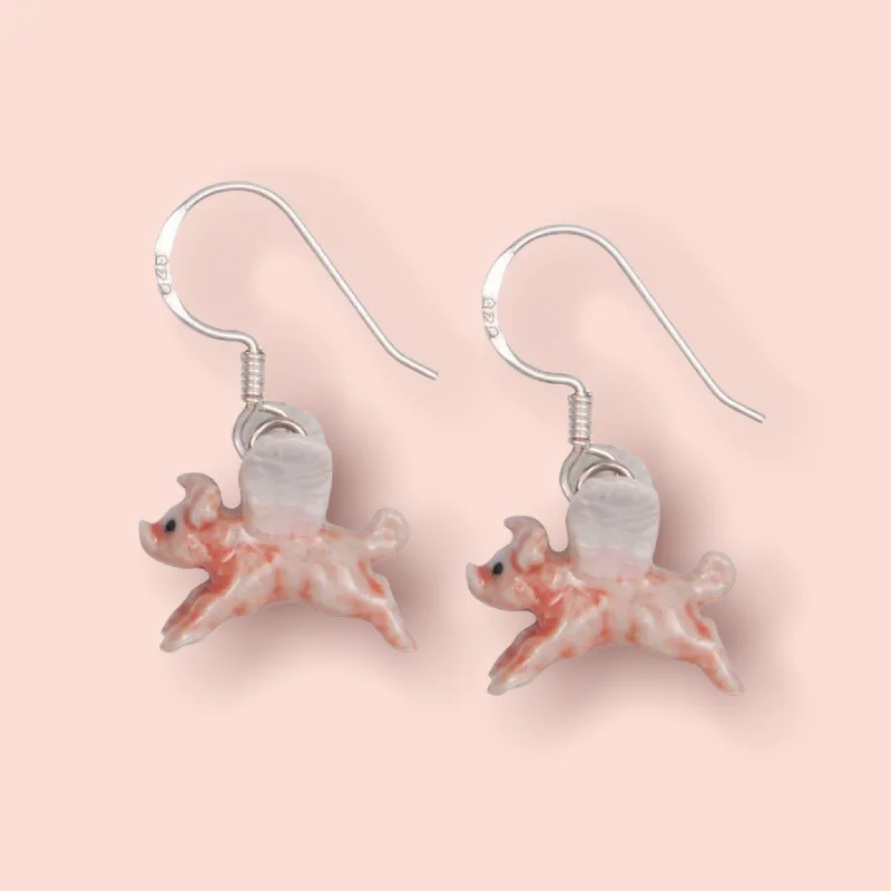 Hoop earrings with cut-out designs for a creative and lightweight effect-Flying pig earrings by And Mary