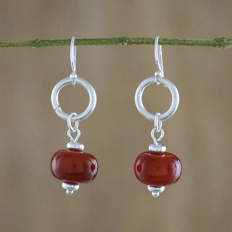 Hoop earrings with leather accents for a sleek and bold combination-Dreamy Night Carnelian and Sterling Silver Dangle Earrings form Thailand