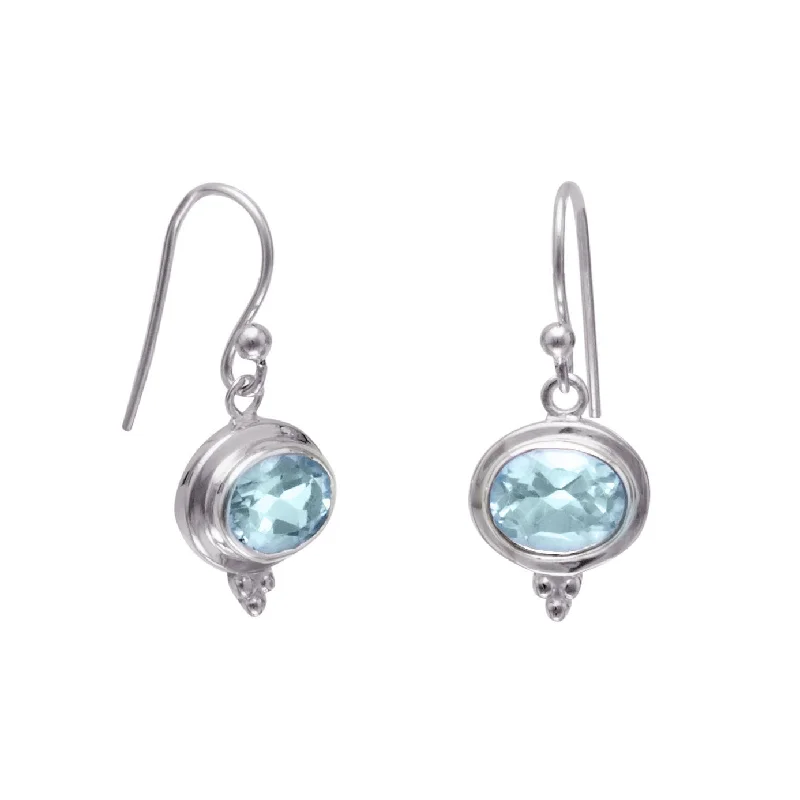 Hoop earrings with rhinestone-studded rims for a glamorous touch-East West Side Set Oval Blue Topaz Sterling Silver Earrings