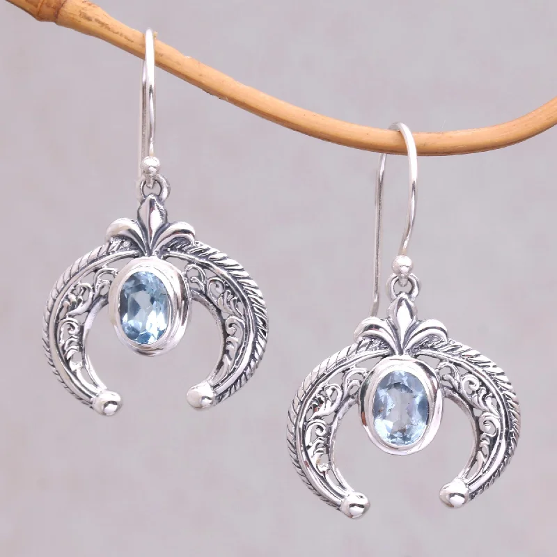 Best hoop earrings with twisted rope designs for a nautical-inspired style-Elegant Talons Indonesian Blue Topaz and Sterling Silver Dangle Earrings