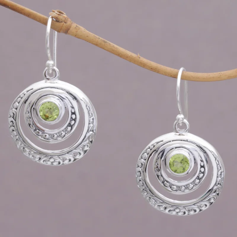 Hoop earrings with twisted leather for a chic and modern boho look-Heavenly Gleam Peridot and Sterling Silver Crescent Earrings from Bali