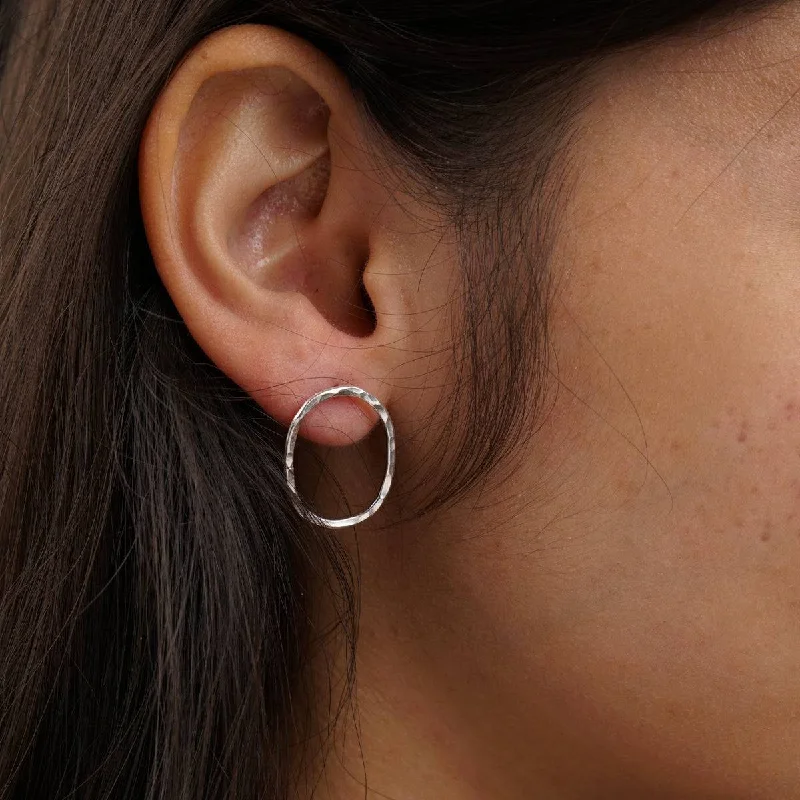 Hoop earrings with crescent moon shapes for a celestial and mystical appearance-Silver Oval Hammered Earrings