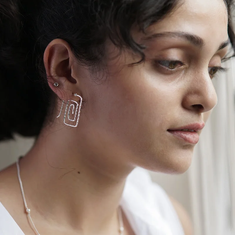 Hoop earrings with leather accents for a sleek and bold combination-Silver Spiral Square Hammered Earrings