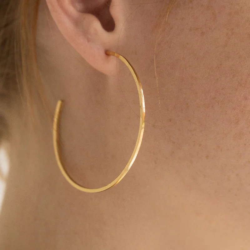 Best hoop earrings with crescent-shaped designs for a bold, moon-inspired style-Thin Hammered Hoops