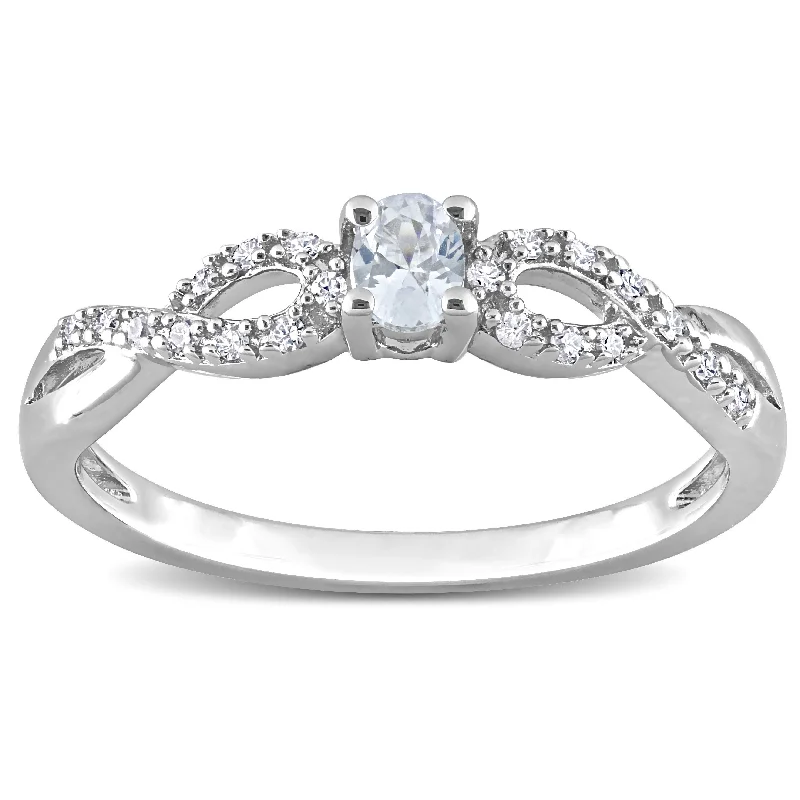 Engagement rings with hidden aquamarine stone accents -Miadora 1/10ct TDW Diamond and Created White Sapphire Infinity Engagement Ring in Sterling Silver