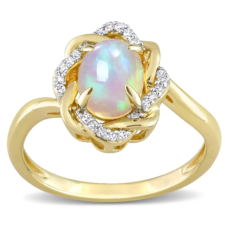 Engagement rings with radiant aquamarine center stones -Miadora 1/10ct TDW Diamond and Ethiopian Opal-Blue Fashion Ring 10K Yellow Gold