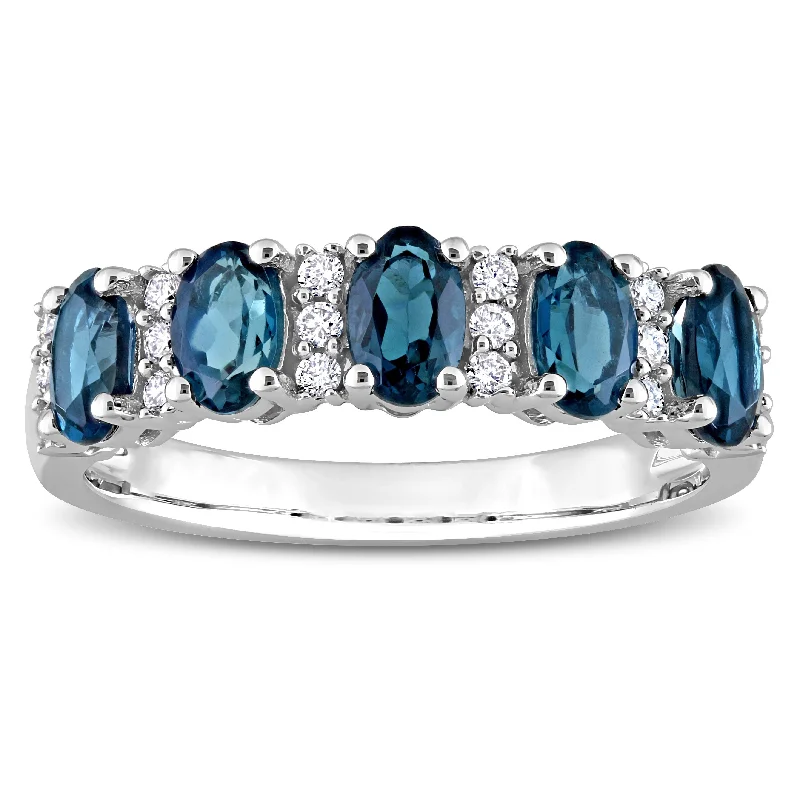 Platinum engagement rings featuring bold turquoise gems -Miadora London Blue Topaz and 1/6ct TDW Diamond Semi-Eternity Ring in 14k White Gold