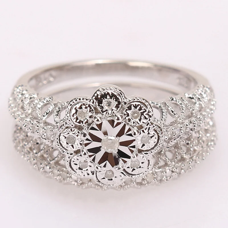 Engagement rings with asymmetrical halo of jade -Miadora Sterling Silver 1/6ct TDW Diamond Floral Vintage Bridal Ring Set