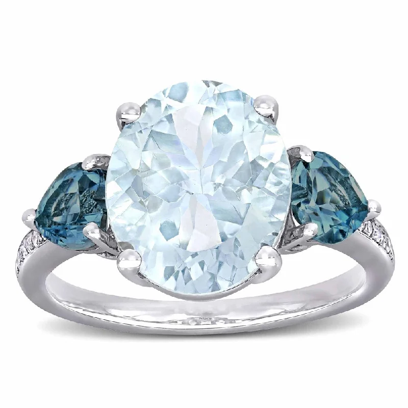 Engagement rings with art deco emerald settings -Miadora Sterling Silver Multi-Cut Ice Aquamarine London Blue Topaz and Diamond 3-Stone Cocktail Ring