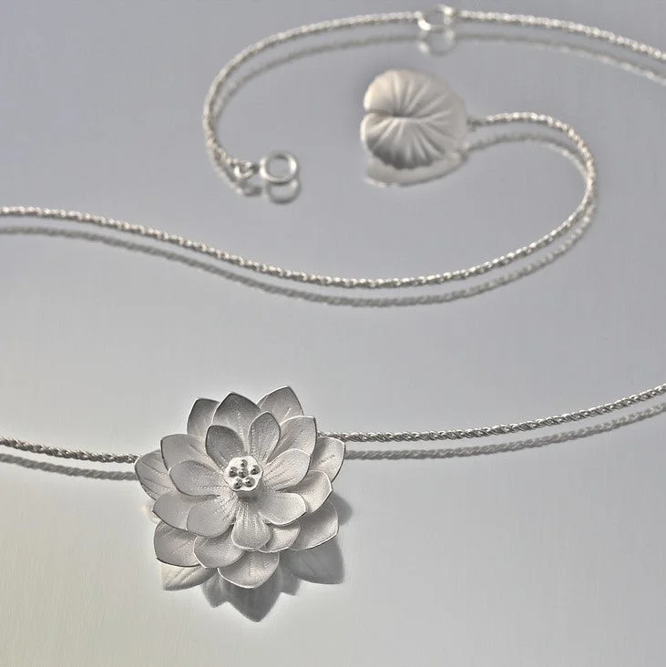 Unique necklaces and pendants with custom birthstone arrangements for personalization-Lotus Flower Sterling Silver Pendant Necklace